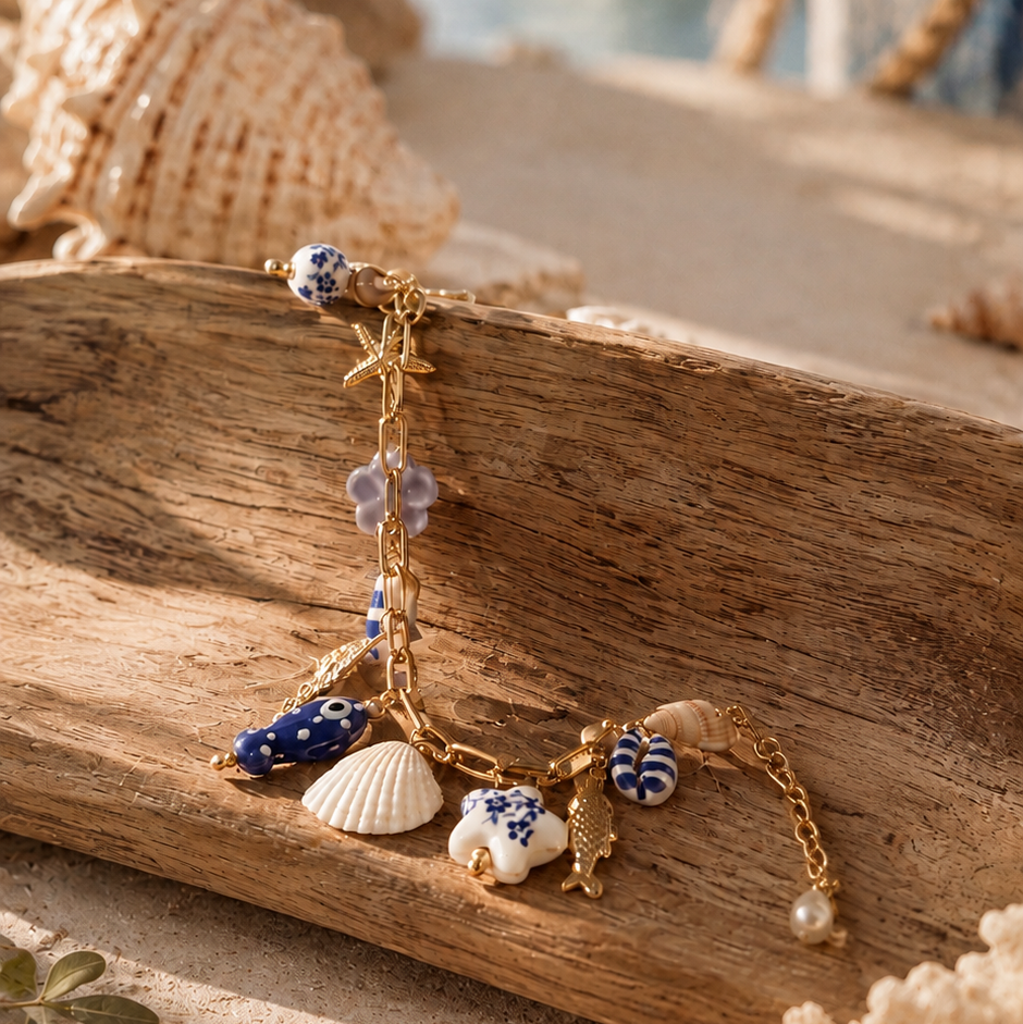 Bracelet breloques bleu & or – Inspiration marine